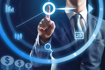Businessman hand pushing time icon on virtual screen.
