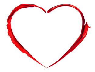 Red heart made of paint splash isolated on white