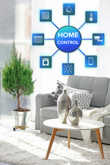 Smart home control concept. Room interior with sofa, table and little tree