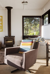 Classic vintage retro lounge recliner chair in 70s beach house