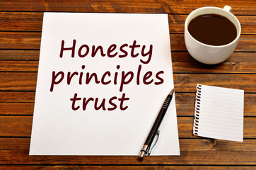 The words Honesty principles trust on paper