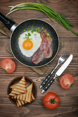 Bacon with sunny side up egg