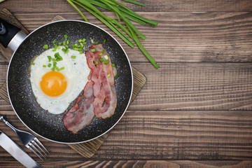 Bacon with sunny side up egg