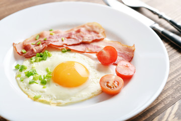 Bacon with sunny side up egg