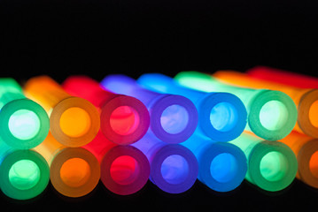 COLORFUL GLOWSTICKS IN A ROW