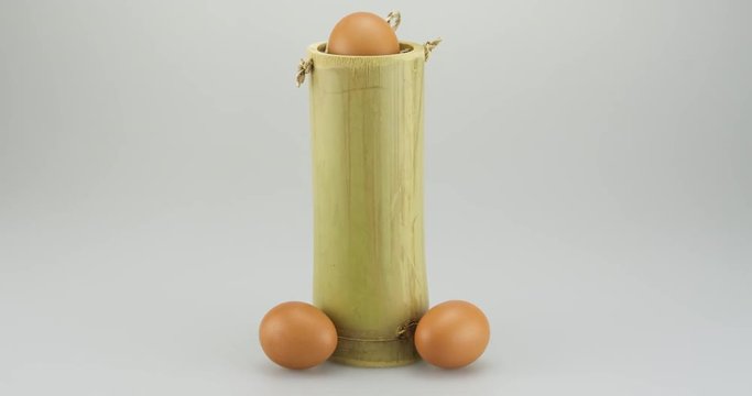 Chicken egg in bamboo tube time lapse