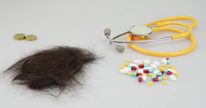 Decreasing of coins and hair loss time lapse