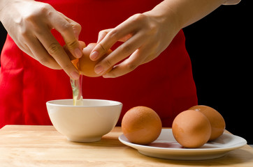 Cracking egg for cooking,food ingredient