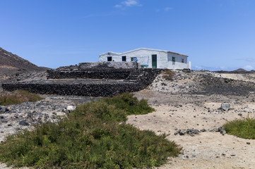 Remote whitewashed  Fishermen’s hut island. © sotavento1000