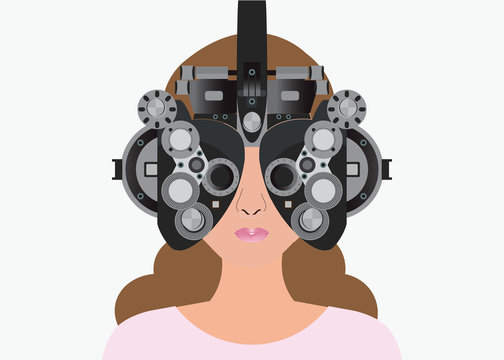 Woman looking through phoropter during eye exam.