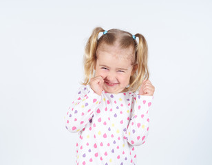 Portrait of a cheerful little girl.