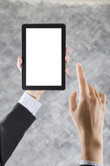 businessman hand holding digital tablet with finger pointing