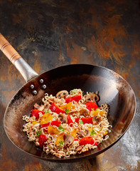 Overhead view of tasty mushroom and noodle wok