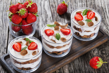 homemade yogurt in cups with whole grain flakes