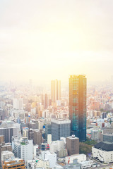 Obraz premium Business concept for real estate and corporate construction - panoramic modern city skyline bird eye aerial view with dramatic sunrise and morning sky in Osaka, Japan