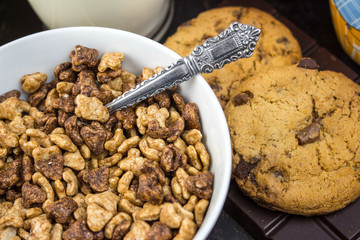 breakfast background, fruit, chocolate and Cereal on table