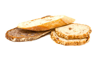 Several pieces of bread on a white background