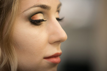 Application of wedding makeup. Preparation of the bride. Boho style. Ease of braided hair braids.