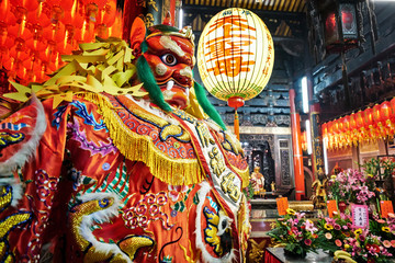 God statue in traditional old oriental chinese temple in Taiwan (Chinese Translation on lantern :...