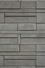 Brick walls are arranged in a straight pattern background.