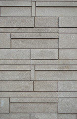 Brick walls are arranged in a straight pattern background.