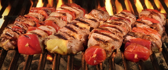 Homemade Kebabs On The BBQ Flaming Charcoal Grill