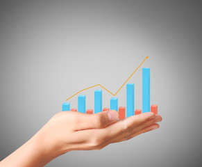 financial chart symbols coming from  hand