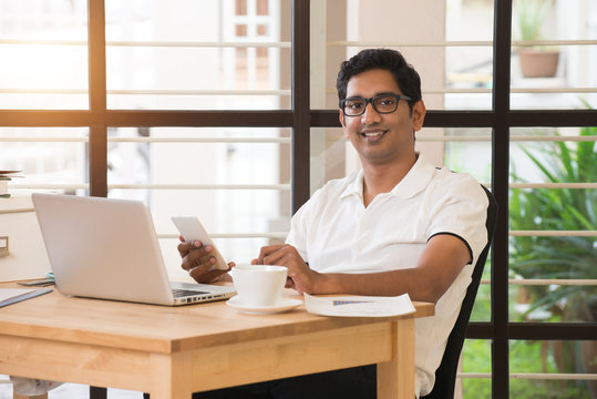 Young Indian Man Working From Home Office