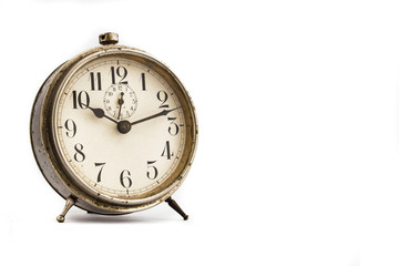 Old alarm clock, isolated on the white background