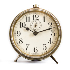 Old alarm clock, isolated on the white background