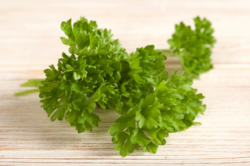 parsley on a wooden background