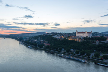 Bratislava, Slovakia - Castle and parliament, sunset view from observation deck of the Bridge