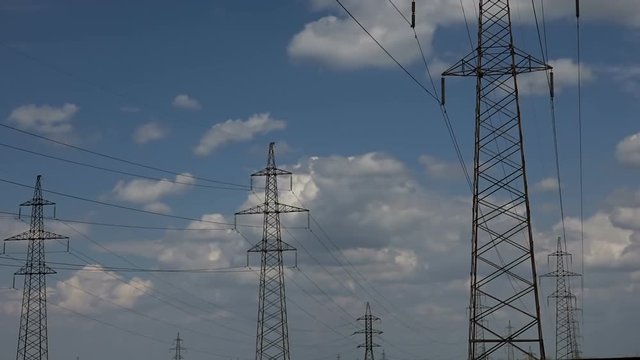 Taymlaps Power Line in the Desert on a Background of Clouds in the Summer