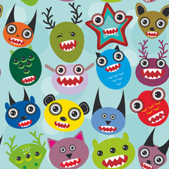 Cute cartoon muzzle Monsters seamless pattern on blue background. Vector