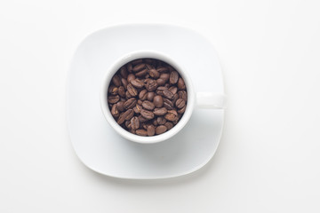 Coffee cup with coffee beans