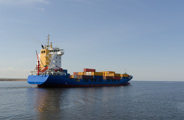  Cargo ship sailing in still water