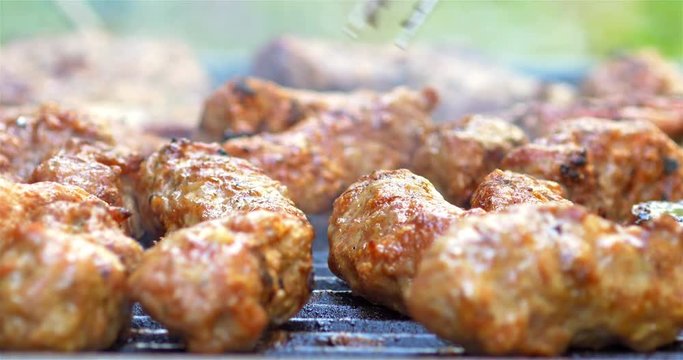 Preparing Traditional Romanian Barbecue With Pork Meat Rolls And Stakes