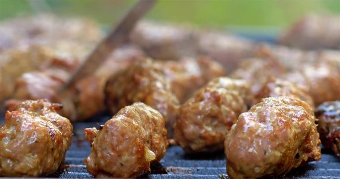 Preparing Traditional Romanian Barbecue With Pork Meat Rolls And Stakes
