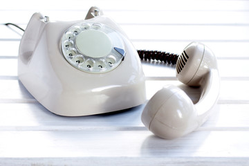 subscriber not available/ dial analog telephone and lying next the telephone receiver lying on a...