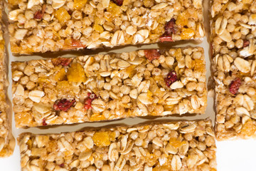 muesli bars with  dried fruit on isolated background