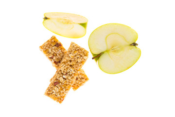 muesli bars dried fruit on isolated background with apple