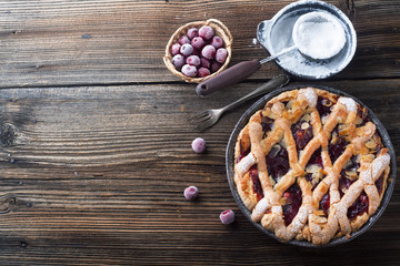 Delicious cake with cherries, icing sugar
