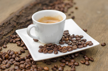 Good Morning: Cup of latte art coffee with coffee beans :)