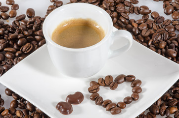 Good Morning: Cup of Expresso with heart shaped coffee beans :)