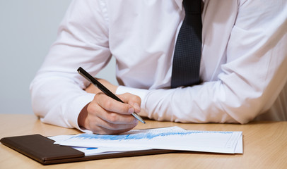 Businessman examining documents