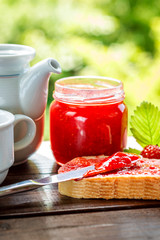 Slice of bread with strawberry jam