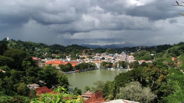 View to the historical part of the city with low clouds in Kandy, Sri Lanka.