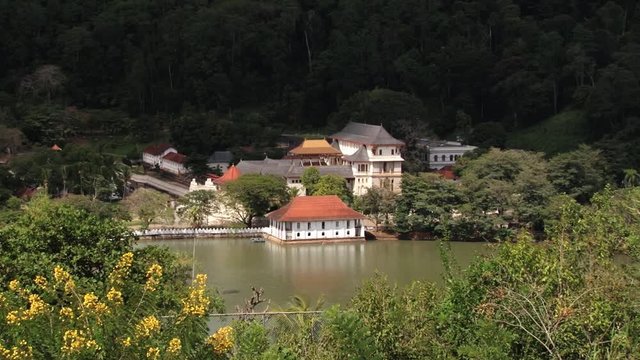 View the Temple of the Tooth (Sri Dalada Maligawa) with the golden roof of in Kandy, Sri Lanka.