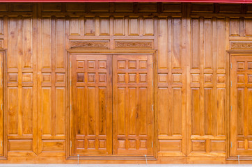 wooden window on a wooden wall.