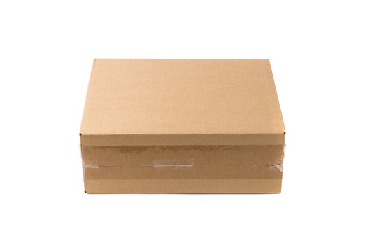 Closed cardboard Box or brown paper package box isolated with so